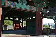 Interior of gatehouse above gate, with city in background (2012)