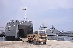 Gharial demonstrating unloading of relief material through its bow door onto the ramp.