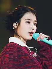 IU performing in 2018.