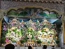 Idols of Sri Sri Radha Madhava, Jagannath, Balarama, Subhadra and Chaitanya Mahaprabhu (in middle), at the Temple of the Vedic Planetarium (ISKCON Mayapur) in Mayapur.