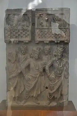 Relief depicting men in antriya and uttariya, first century AD.