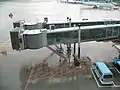 Note outboard gantry and driving wheels on a jet bridge at Incheon Airport, South Korea