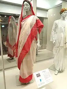 Image 20Red and cream Indian woman's saree, late 1990s (from 1990s in fashion)