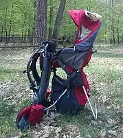 Hard-framed backpack baby carrier