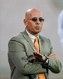 Portrait of Stephen Constantine wearing goggles.