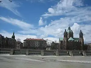 Weir on the River Isar with St. Luke's