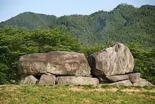 Two huge and a couple of smaller rocks.