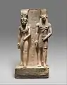 A statue of Wepwawet with the goddess Isis-Hathor, which belonged to an official named Siese who worked under Ramesses II