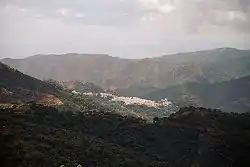 View of Istán from the Sierra de las Nieves with the coast and Gibraltar in the background