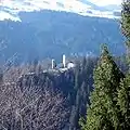 The castle and surrounding mountains