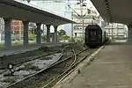 The through cars waiting on the "dead-end" in front of the buffer stop; they are supposed to go with the night train 600 from Athens to Alexandrúpoli as far as Strymonas, June 2016.