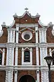 Details of the pediment and pilasters prior to the restoration