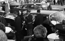 Jacqueline Kennedy and Robert F. Kennedy about to enter a limousine on November 24, 1963.