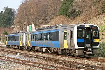 A two-car KiHa E200 series train on the Koumi Line, April 2009