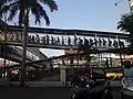 A long queue at Harmoni BRT station during rush hours, 2014