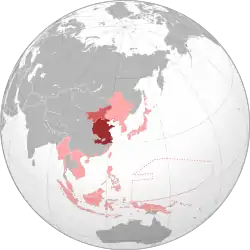 The Wang Jingwei regime (dark red) and Mengjiang (light red) within the Empire of Japan (pink) at its furthest extent