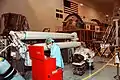 A worker assembles parts for the Japanese Experiment Module and its robotic arm