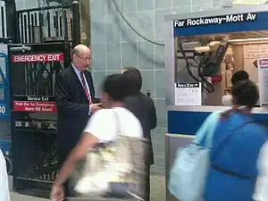 Jay Walder, then-chairman of the MTA, greets Hurricane Irene evacuees