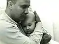 Sri Chinmoy holding Jayanti Tamm in his arms in 1970, when she was four months old. Tamm left the group decades later.