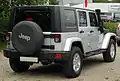 Jeep Wrangler spare wheel cover printed with a dealer's name