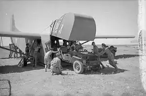 Jeep loading onto Waco glider