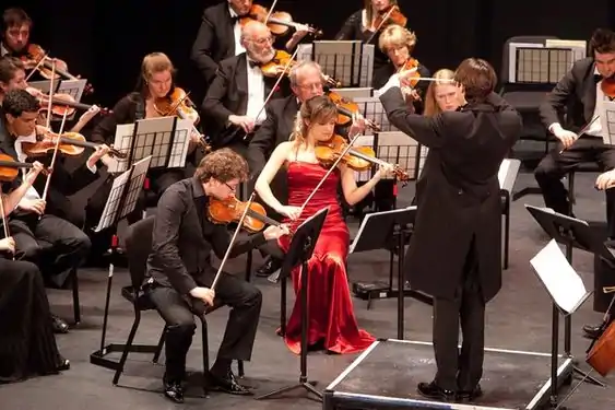 Nicola Benedetti and Alexander Sitkovetsky playing with the Jersey Chamber Orchestra as part of the Liberation Festival.