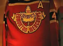 Photo of hockey jersey with a maple leaf crest