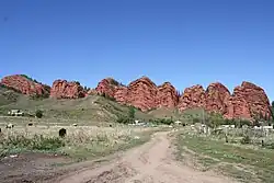 The Jeti-Ögüz rock formation from which Jeti-Ögüz District gets its name, and near-by resort.