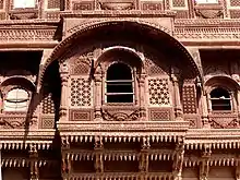 Ornate jharoka with 'Do-chala' slooping roof