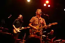 Dustin Boyer (left) with John Cale and drummer Michael Jerome in Prague, 2006