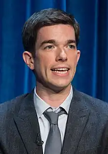 Mulaney in a suit