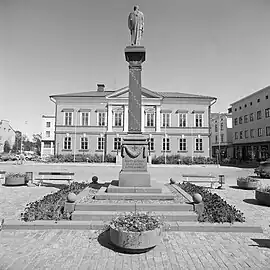 Vapaudenpatsas (Statue of Liberty) in Kokkola right across the town hall, 1920. Names of those who died in the Finnish Civil War are carved into the base. In his right hand he has a sword and on his left shoulder is a shield.