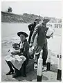 Original caption: "Negro Family waiting for ride into town", Halifax County, Virginia, March 1941.