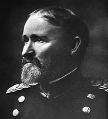 Black and white head and neck photo of John Wilson Ruckman in Army dress uniform, left profile