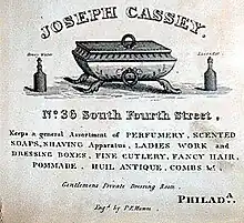 Cassey's barber shop advertisement, 1832; reads "keeps a general assortment of perfumery, scented soaps, shaving apparatus, ladies work and dressing boxes, fine cutlery, fancy hair, pommade, “huil antique”, combs"