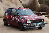 Jalopy car in Joshua Tree National Park in Hidden Valley Campground. A "derby car" is a typical term for a decrepit car used for racing, often spray painted or decorated in various ways.