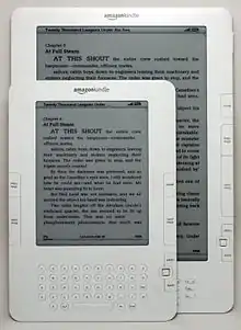 A Kindle DX underneath a Kindle 2