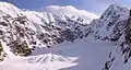 Kahiltna Queen at upper right, viewed from north slope of Mount Hunter.Head of Southeast Fork Kahiltna Glacier below.