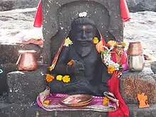 Statue of Kapila Muni on the bank of Kapila River, Nashik