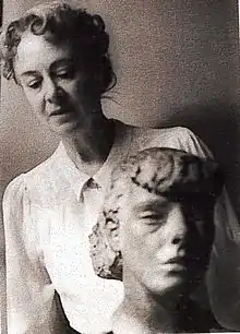 Kathleen Hewitt with a sculpture by Sir Jacob Epstein