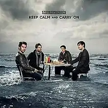 Stereophonics members sitting on a table in the ocean on a cloudy day, looking at us. The words "STEREOPHONICS" with a line and "Keep Calm AND Carry On" can be seen above the people.