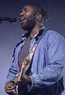 Okereke performing in November 2018