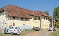 A building with cars parked in front