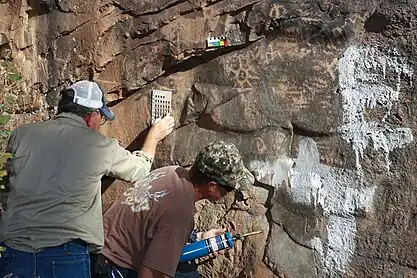 The petroglyphs during restoration