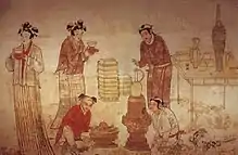 Mural painting from the Tomb of Zhang Kuangzheng (M10), Liao dynasty, 1058-1093 AD. Children and servants wear Khitan-style clothing and hairstyle; the standing women wears Han Chinese clothing. The hairstyle of the women is Khitan-style.