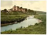 The castle in the 1890s, with the ruins partly overgrown