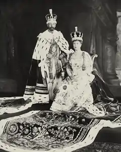 Queen Mary wearing the crown in a formal coronation photograph, 1911