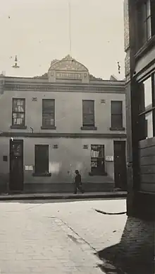 Photograph of the Kong Meng building on Little Bourke Street, taken in 1934