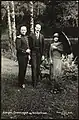 King Haakon VII, Crown Prince Olav and Queen Maud in the estate gardens, 1924