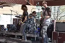 The band Kongos performs for a live audience